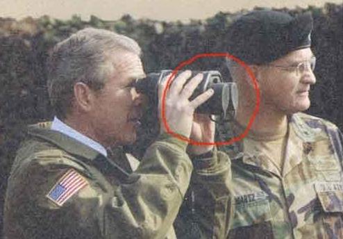 Bush examines progress of the surge by binoculars